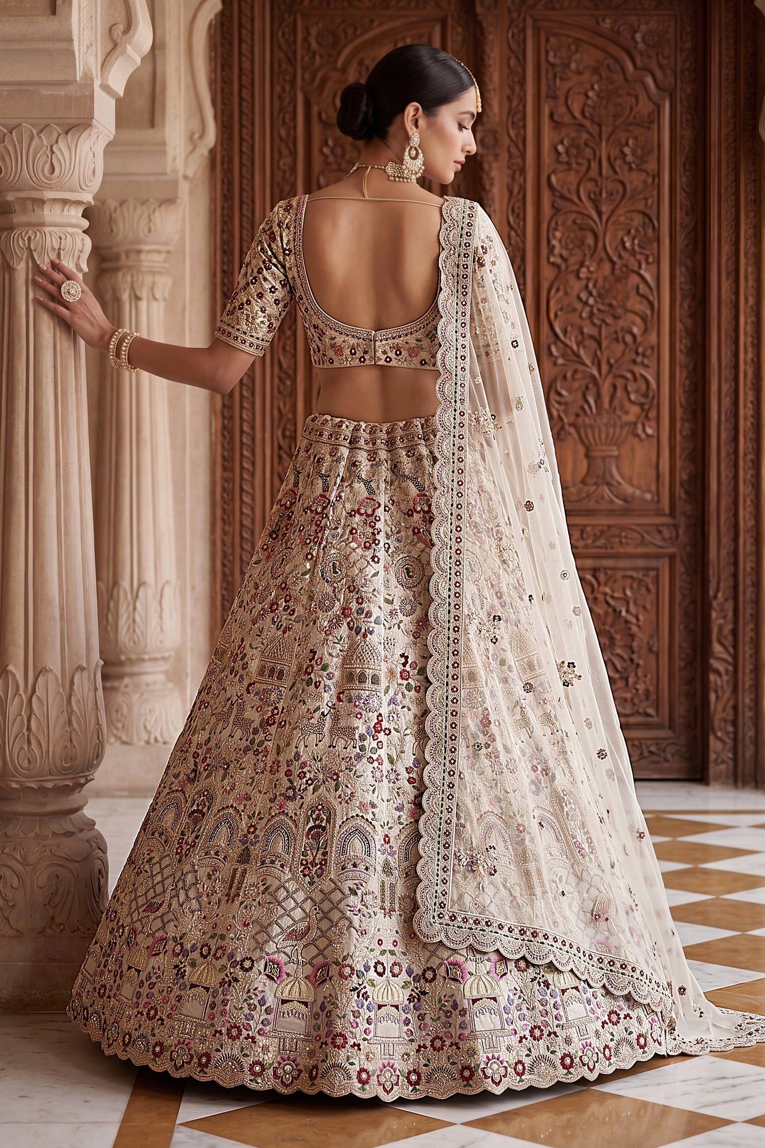 Beige Heavy Embroidery Sangeet Function Lehenga Choli