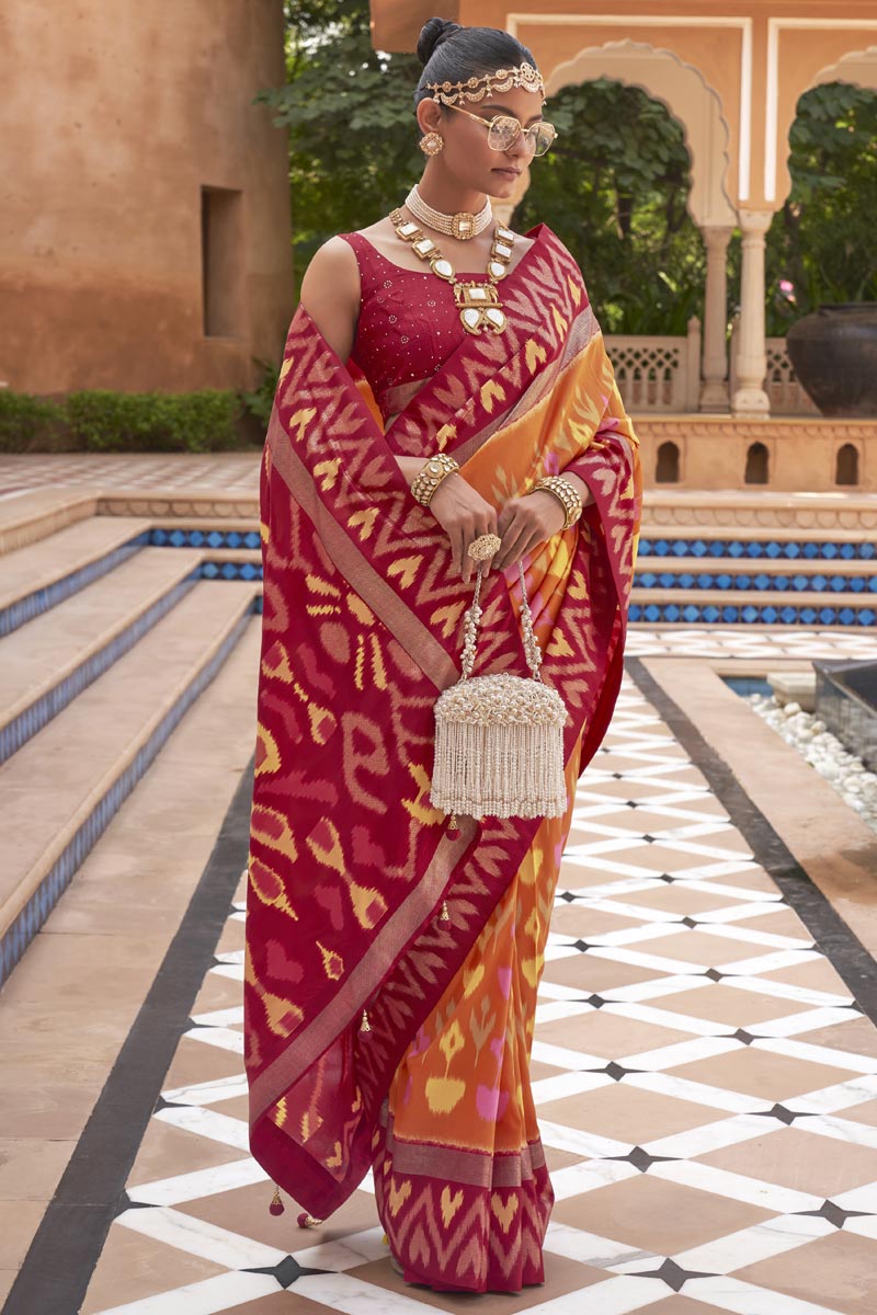 Tempting Art Silk Fabric Orange Color Patola Saree With Printed Work