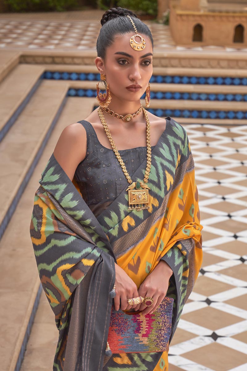 Marvellous Printed Work On Art Silk Fabric Patola Saree In Yellow Color