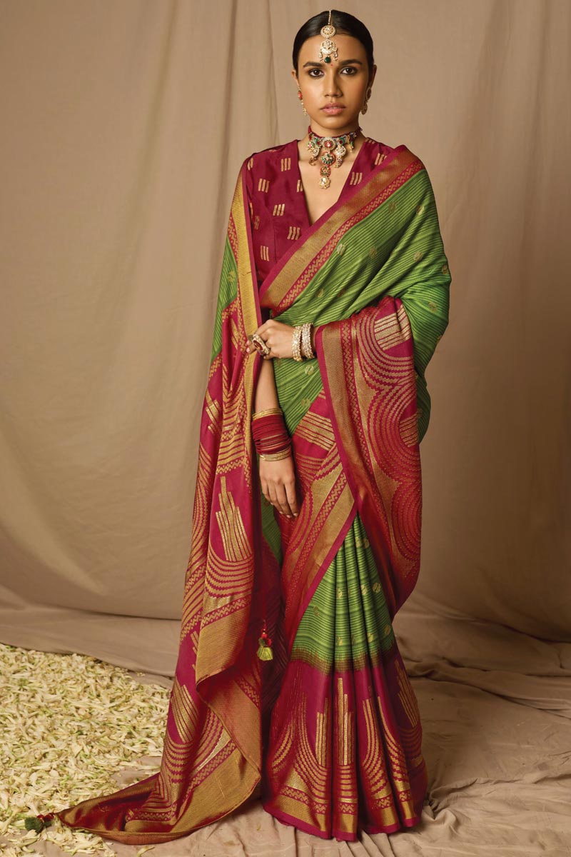 Soothing Weaving Work On Green Brasso Fabric Saree
