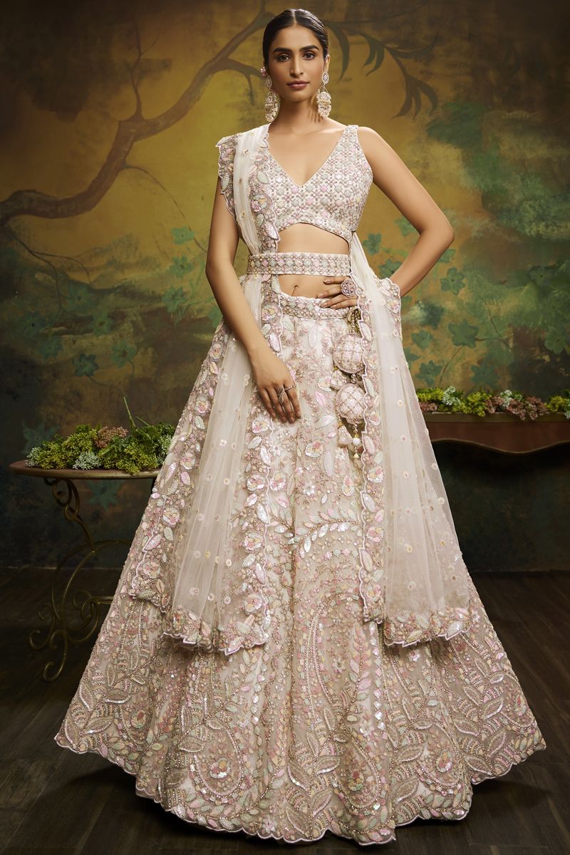 Embroidered Work On Cream Color Net Fabric Wedding Wear Lehenga Choli