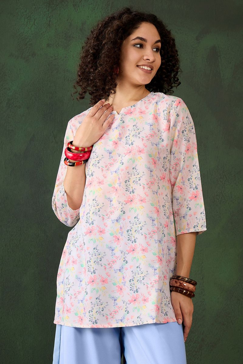 Embroidered Work On Short Kurti In Off White Color Rayon Fabric