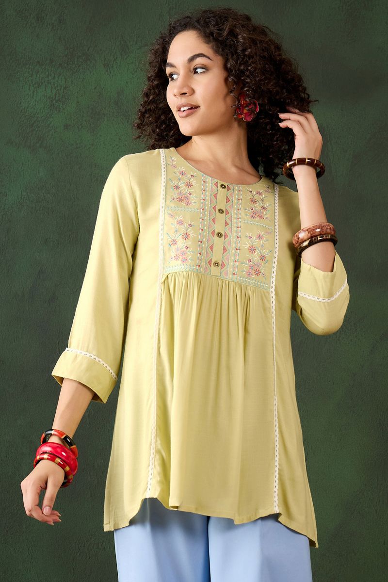 Rayon Embroidered Work On Short Kurti In Beige Color