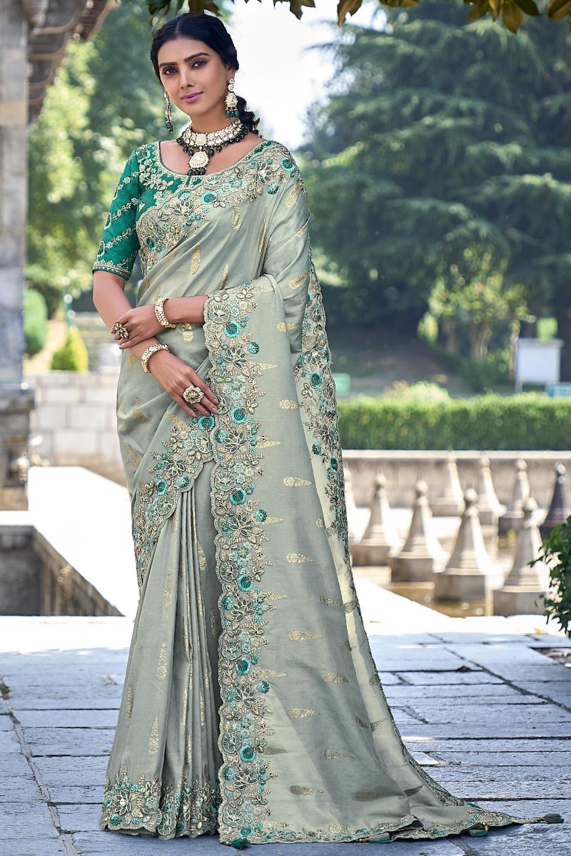 Engaging Sea Green Silk Saree With Heavy Embroidered Blouse