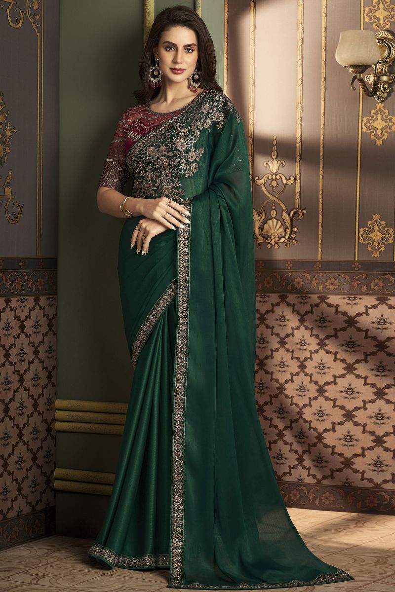 Border Work On Art Silk Fabric Bewitching Sangeet Wear Saree In Dark Green Color