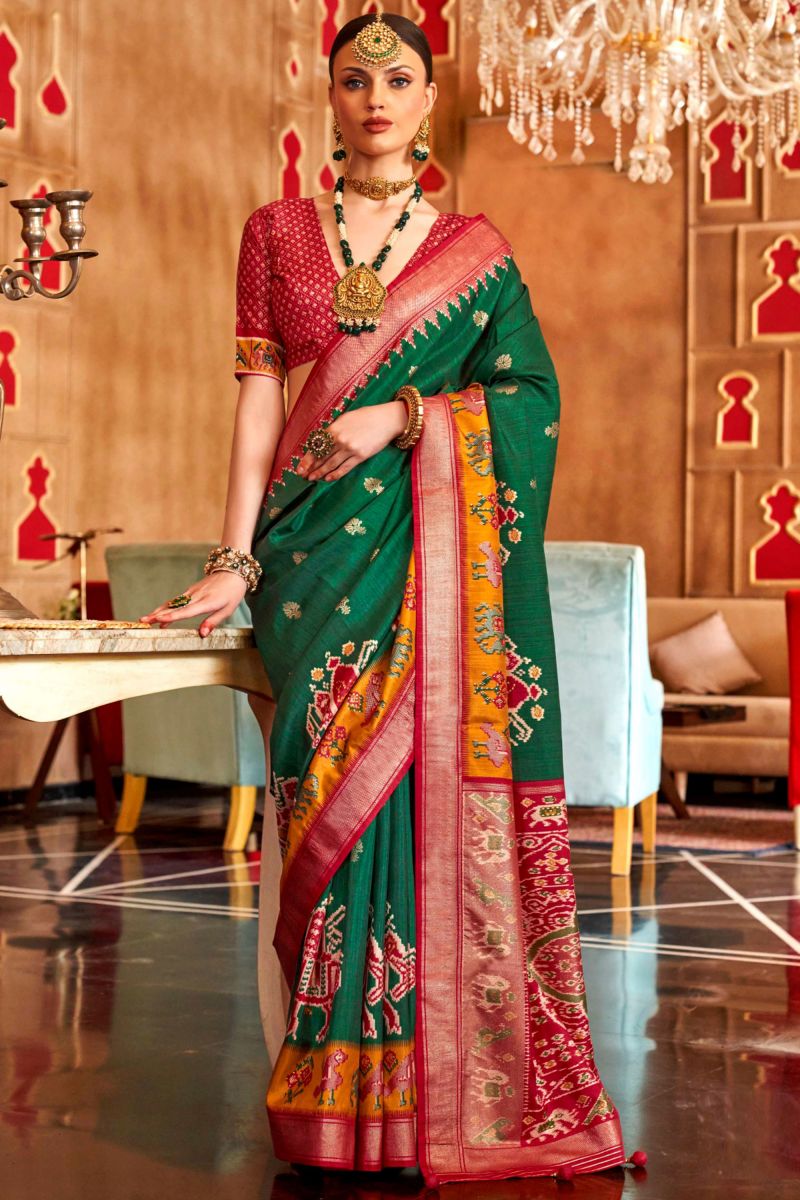 Art Silk Fabric Bewitching Patola Printed Saree In Green Color