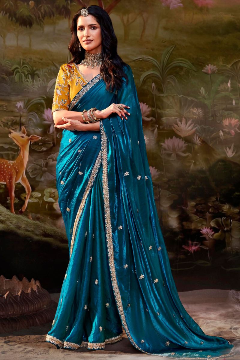 Teal Color Sober Saree In Fancy Fabric