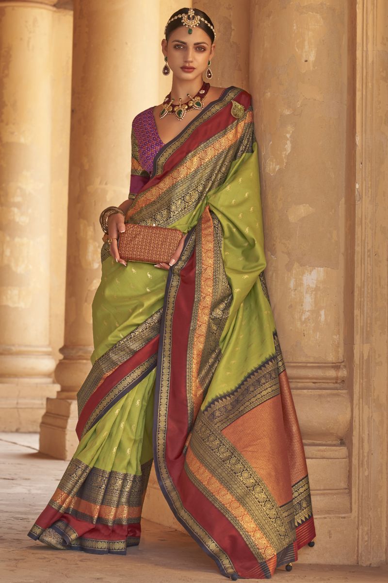 Green Color Kanjivaram Silk Fabric Weaving Print Festive Wear Fancy Saree With Patola Design Blouse