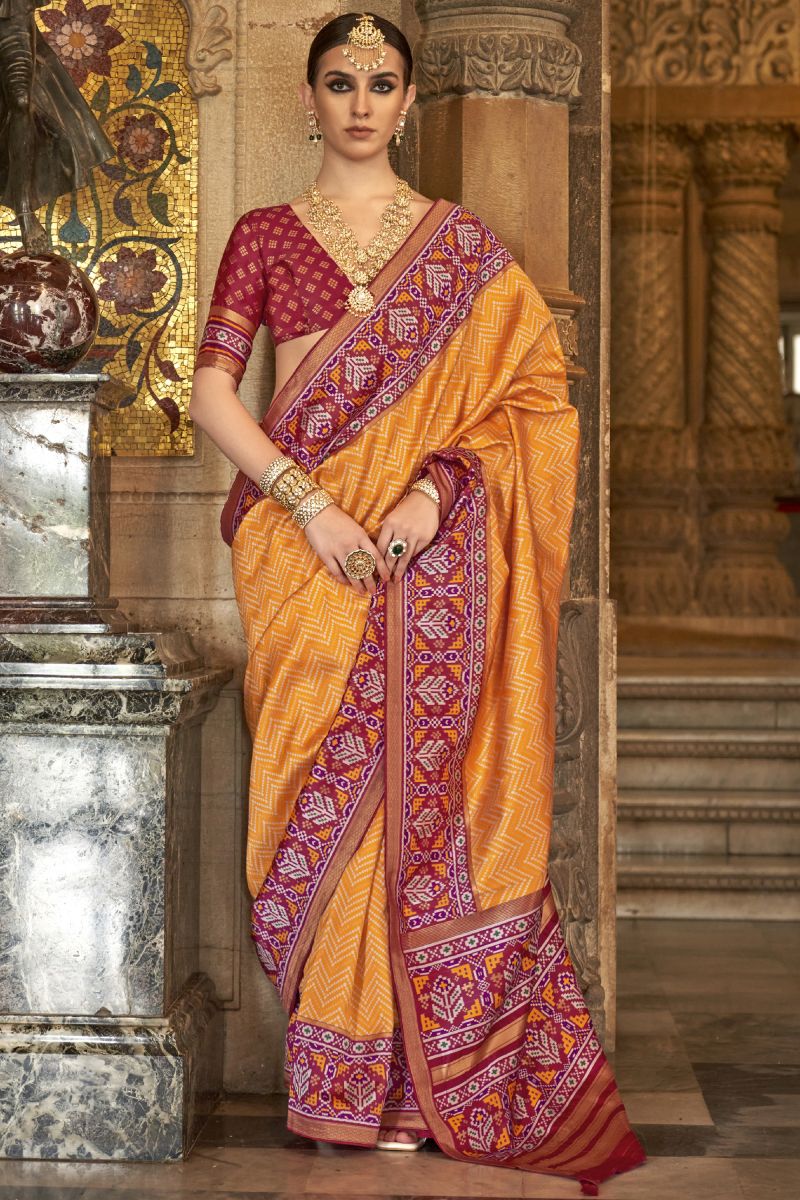 Printed Orange Color Art Silk Fabric Patola Saree