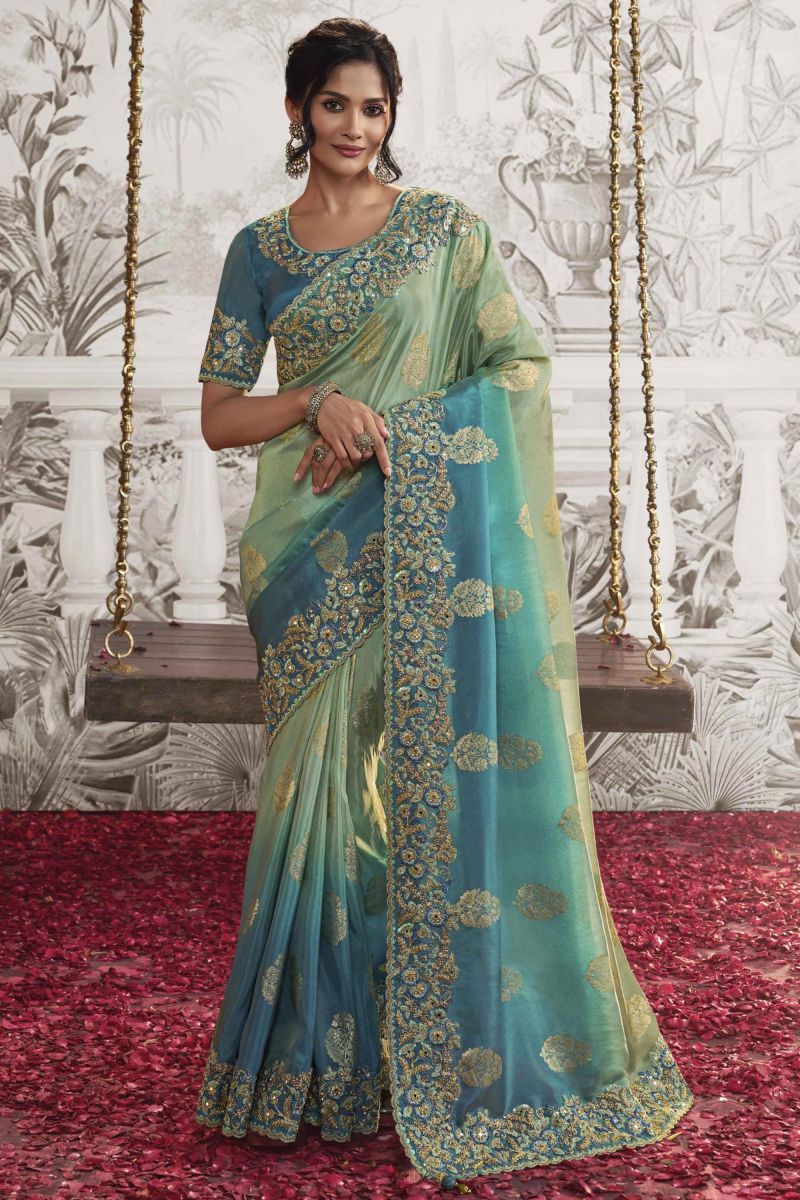 Heavy Embroidery Work Winsome Sea Green Color Fancy Fabric Saree With Party Look Blouse