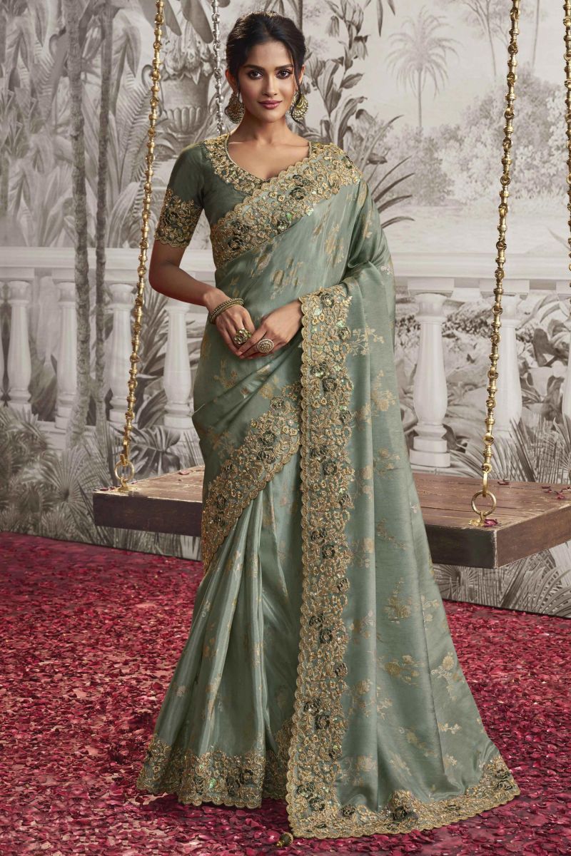 Sea Green Color Heavy Embroidery Work Fancy Fabric Saree With Party Look Blouse