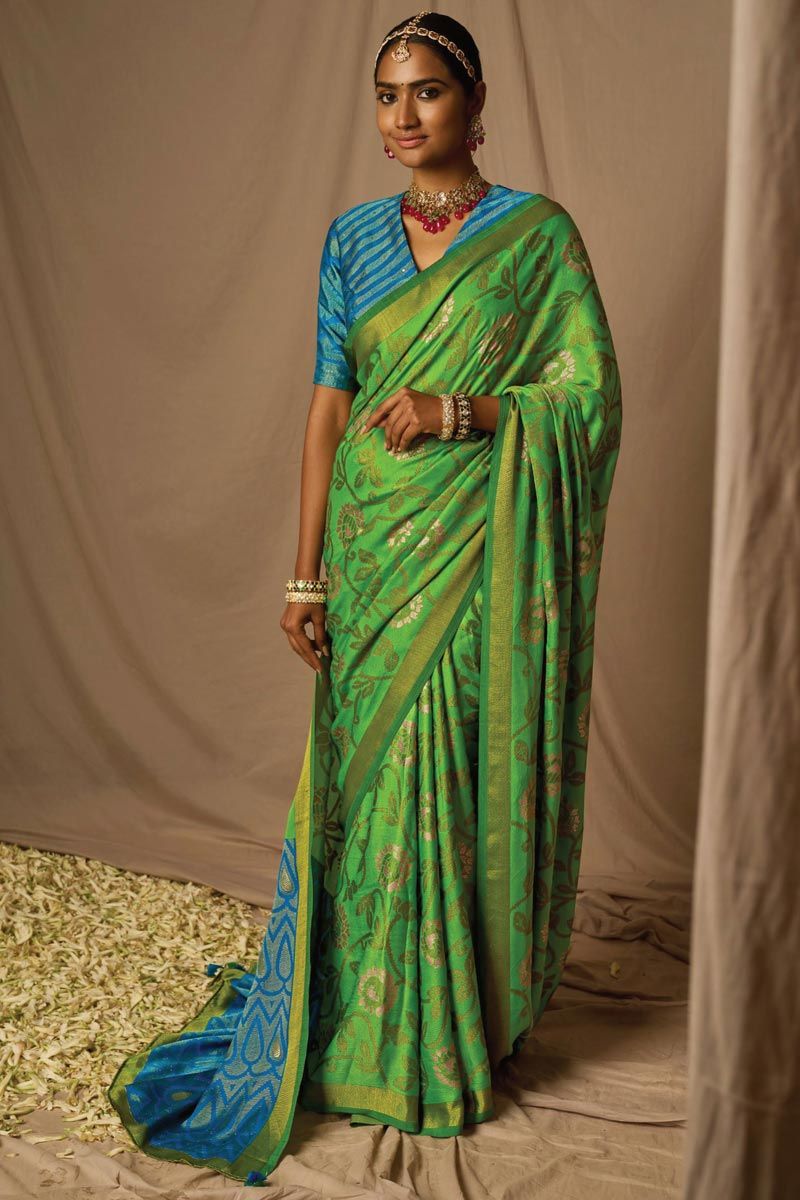 Engaging Green Color Brasso Fabric Saree With Weaving Work