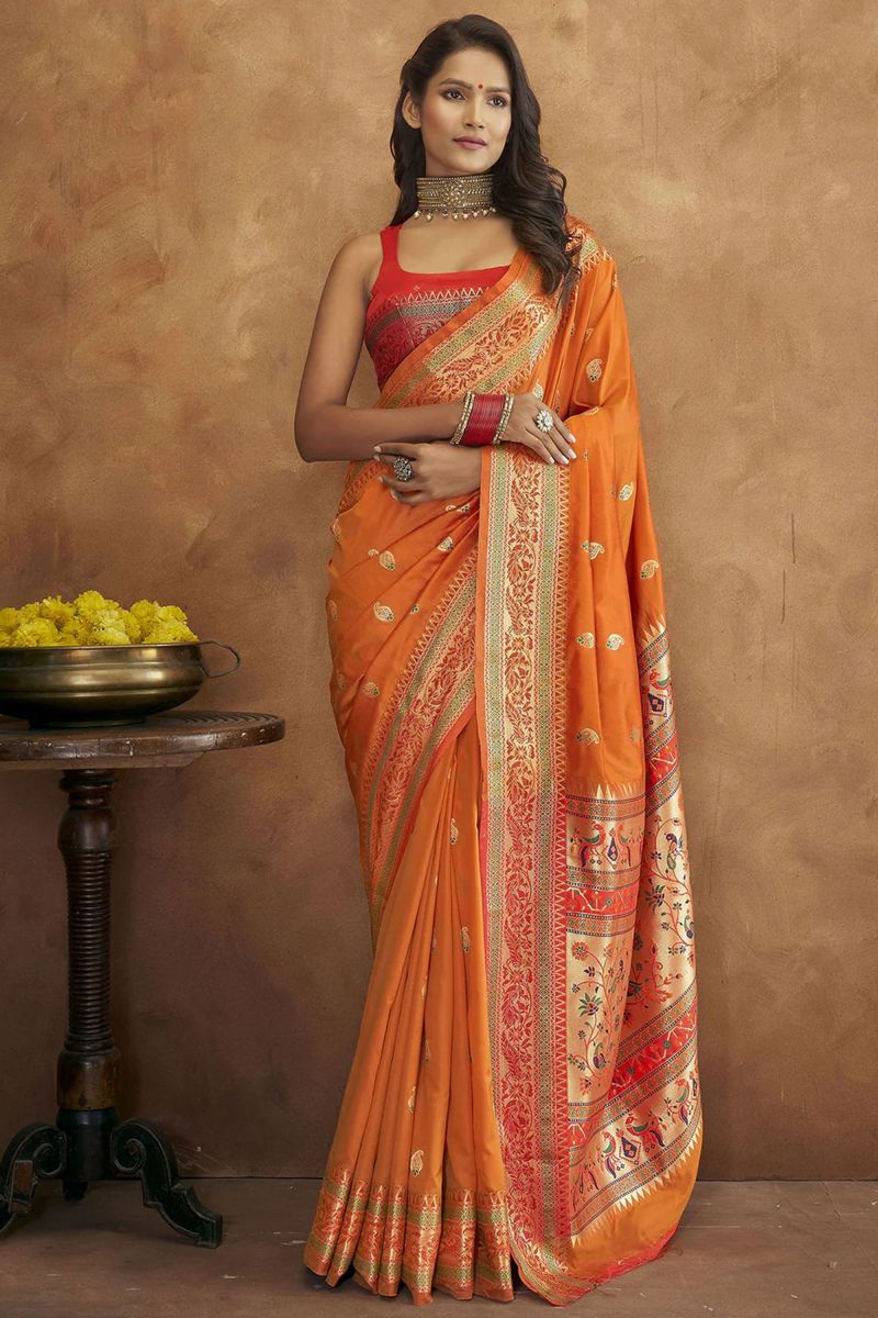 Wedding Wear Bewitching Paithani Silk Saree In Orange Color