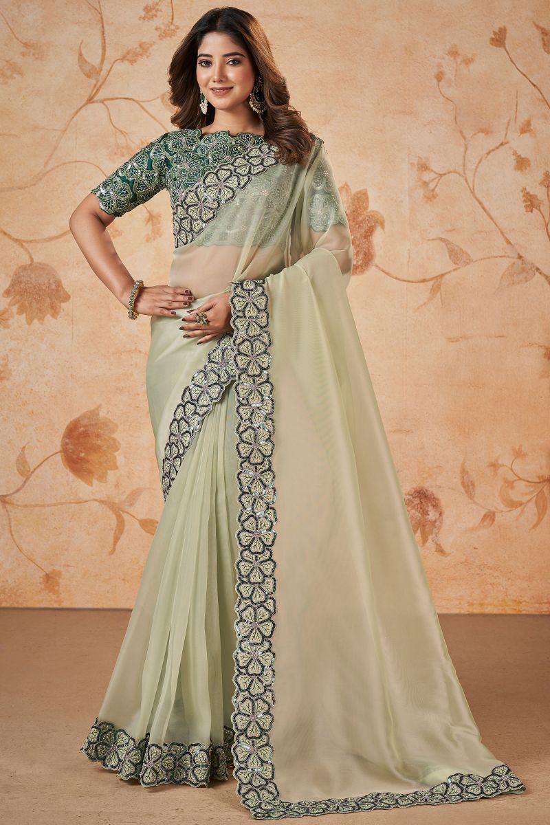 Wedding Wear Net And Georgette Fabric Sea Green Color Sequins Work Saree