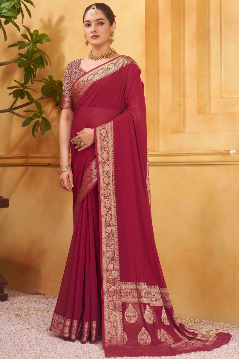 Weaving Border Work On Georgette Fabric Saree In Maroon Color