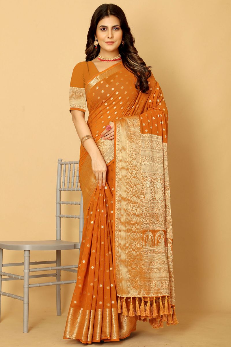 Party Wear Georgette Fabric Orange Color Saree With Weaving Work