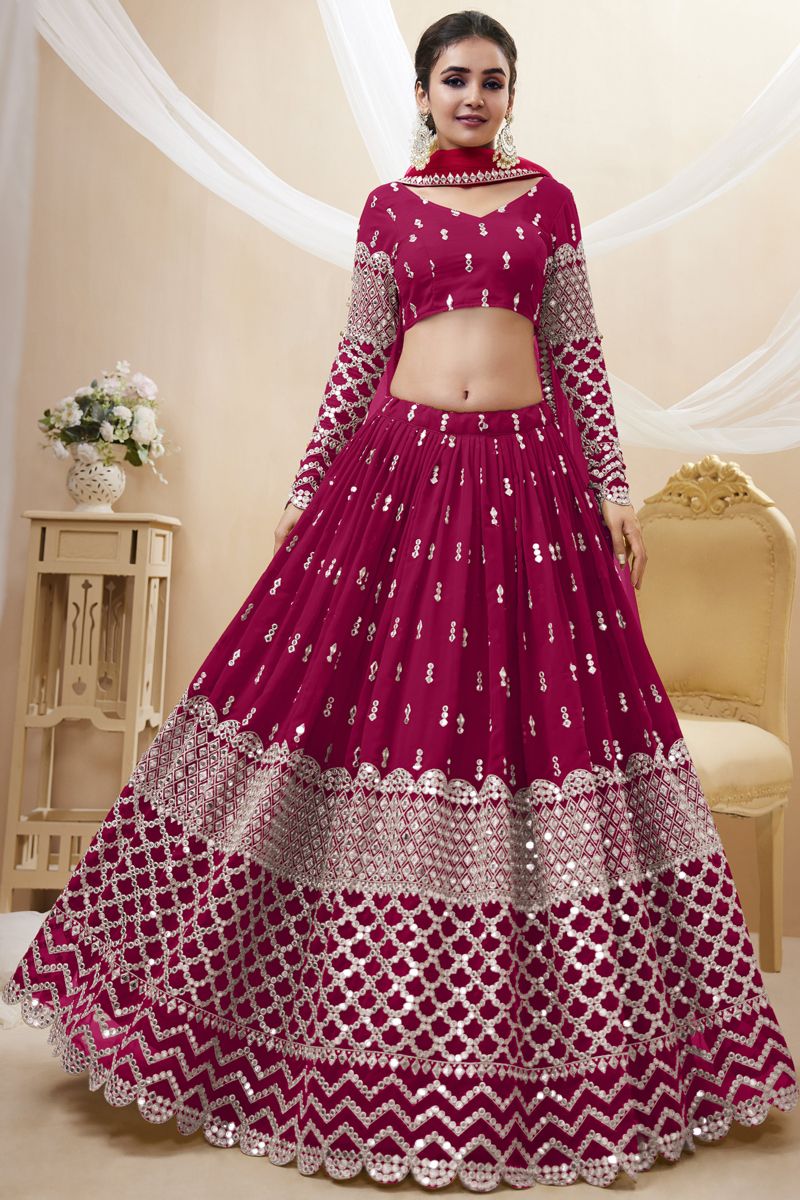 Embroidered Rani Color Wedding Wear Fancy Lehenga Choli In Georgette Fabric