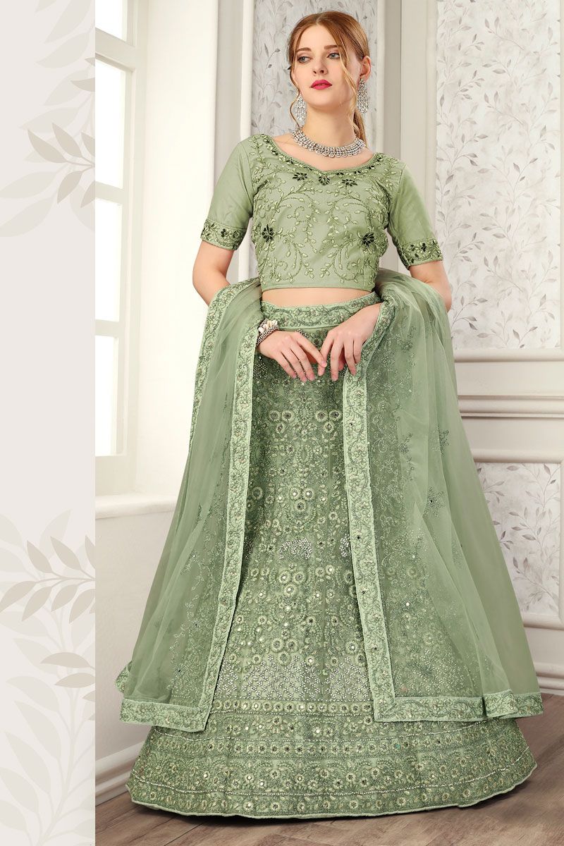 Net Sangeet Wear Lehenga Choli In Green Color