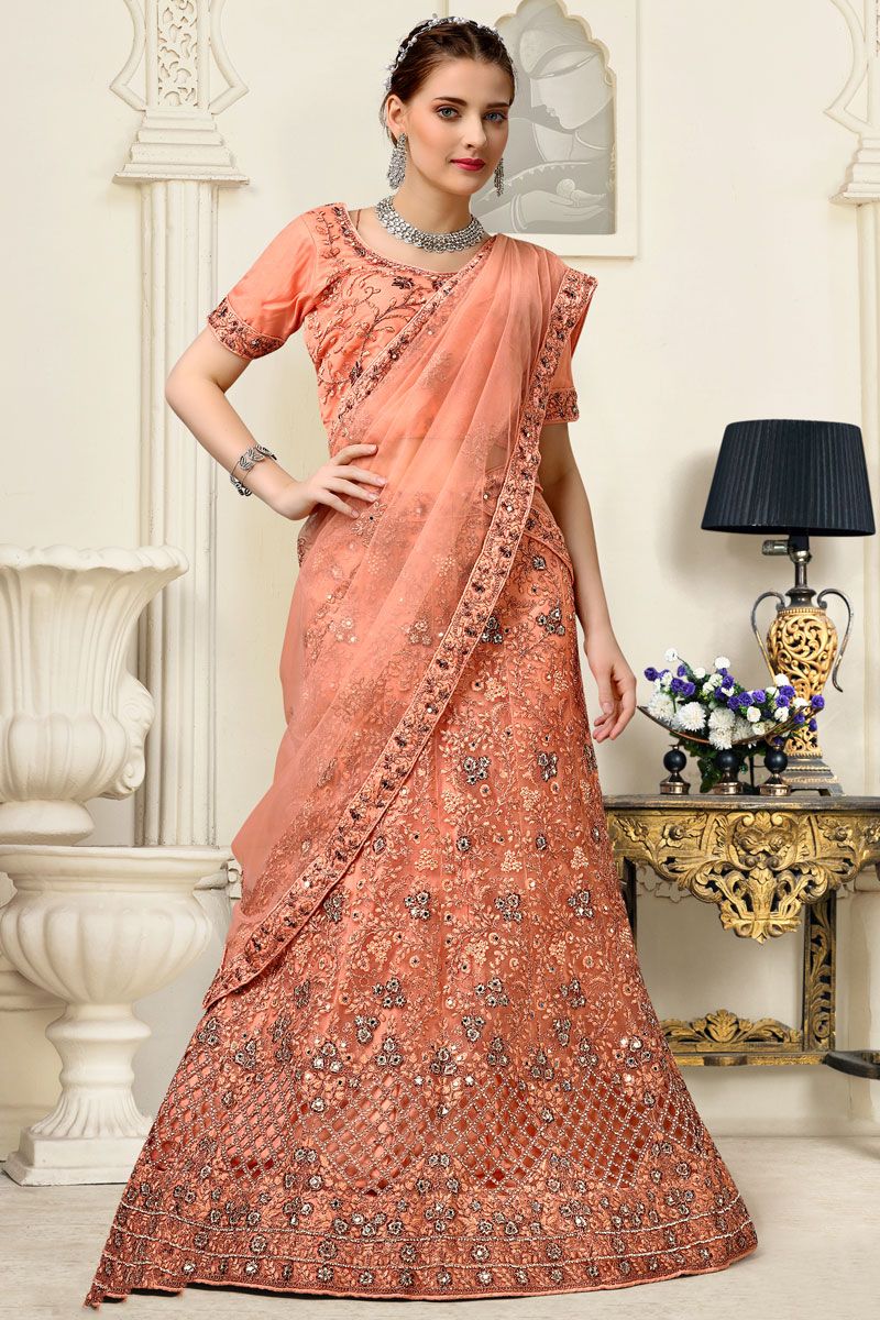 Net Sangeet Wear Lehenga Choli In Orange Color