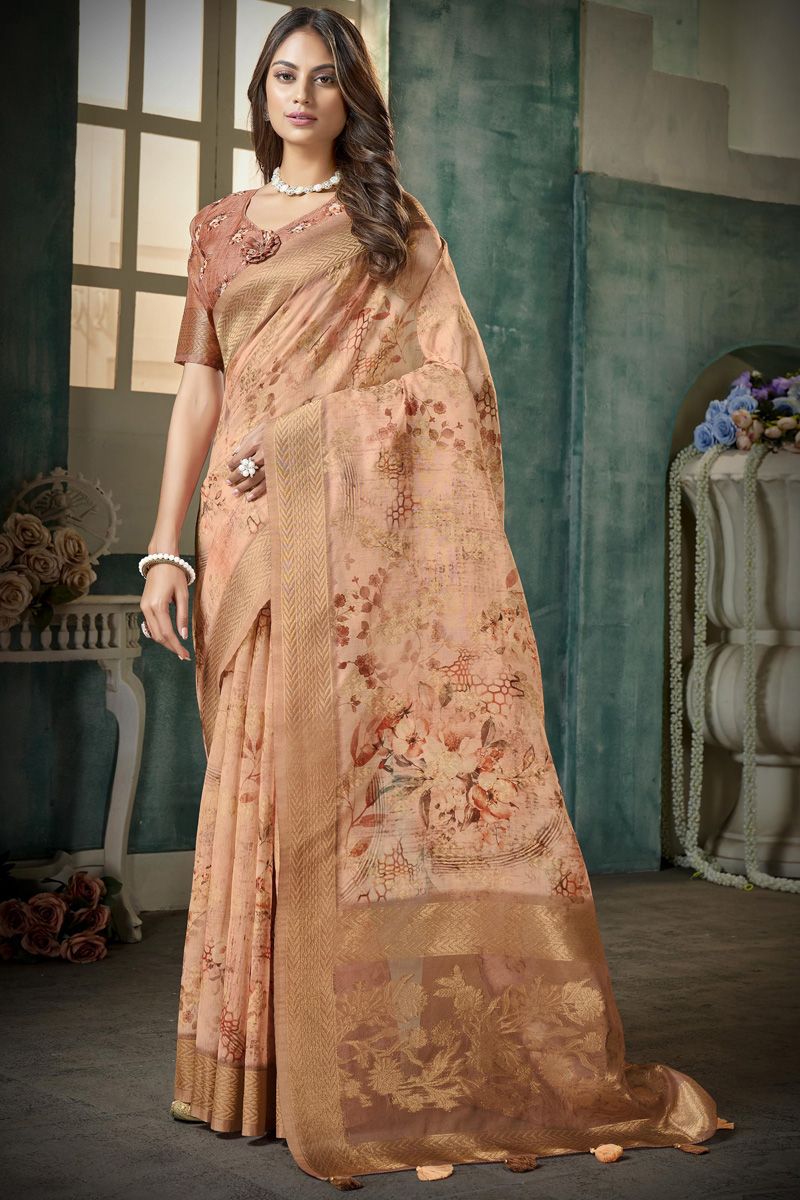 Sober Organza Fabric Peach Color Festive Look Floral Printed Saree