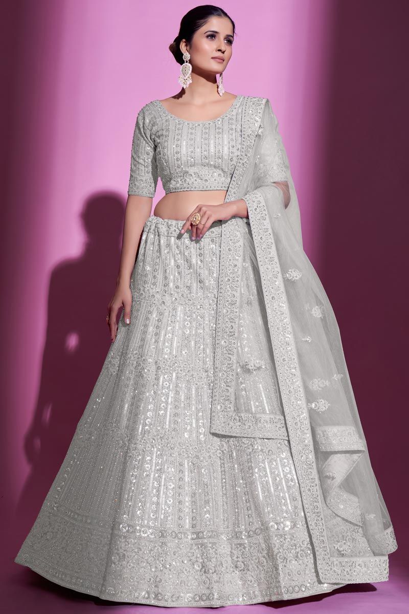 White Color Net Fabric Engrossing Lehenga