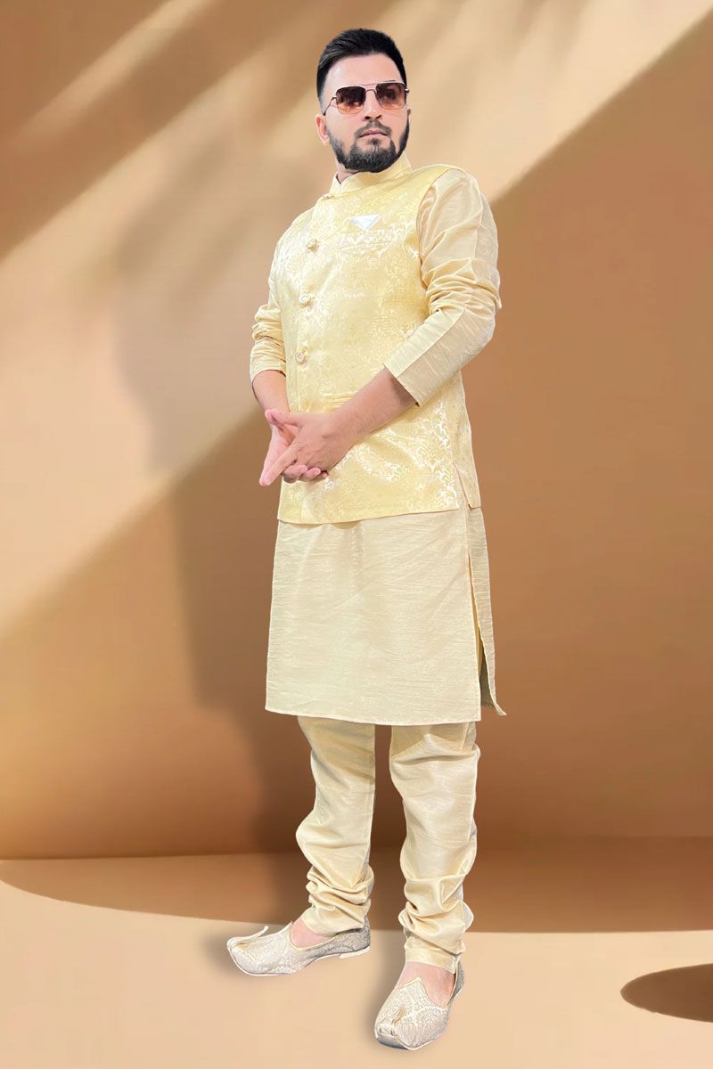 Enriching Function Wear Silk Fabric Cream Kurta Pyjama With Yellow Jacket