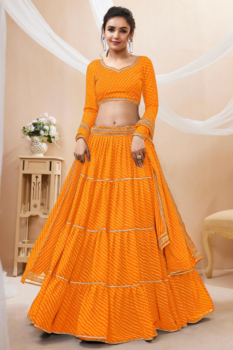 Beguiling Leheriya Printed On Yellow Color Georgette Fabric Lehenga