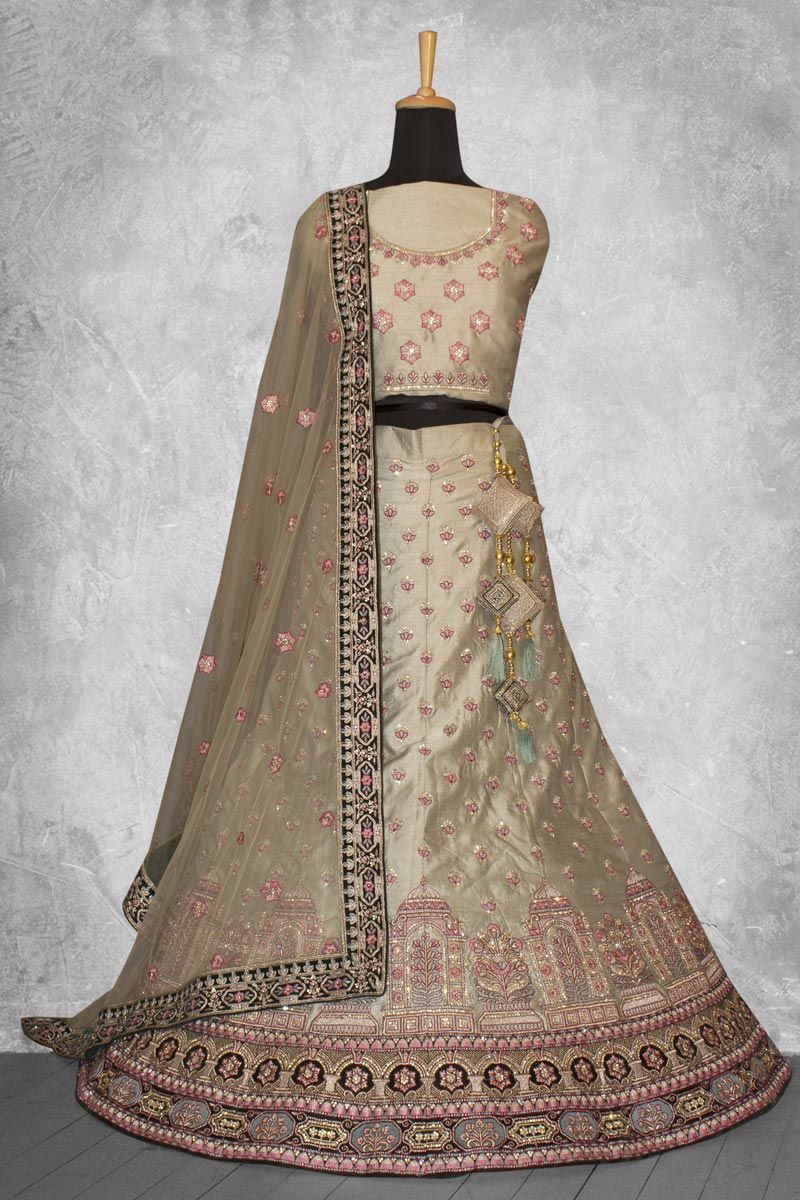 Art Silk Fabric Cream Color Lehenga With Embroidered Work 