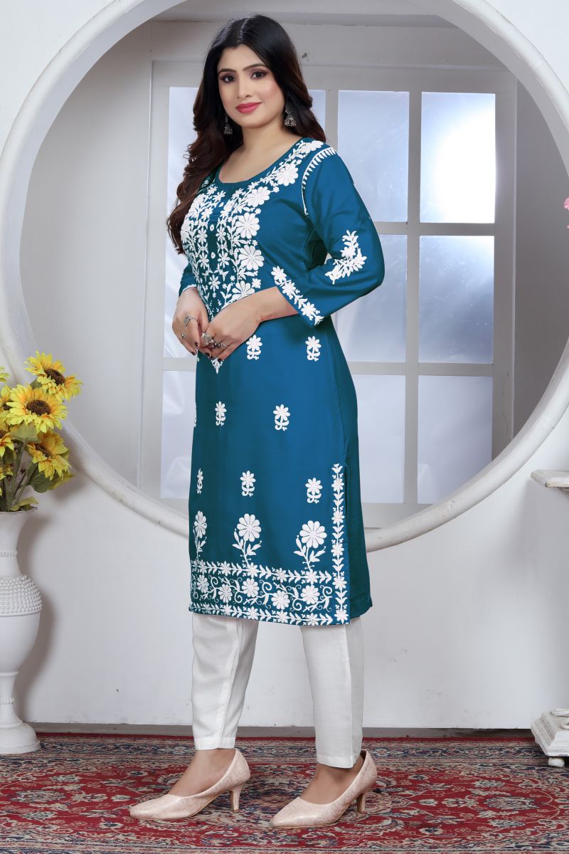 Bewitching Rayon Fabric Chikankari Embroidered Kurti With Bottom In Blue Color