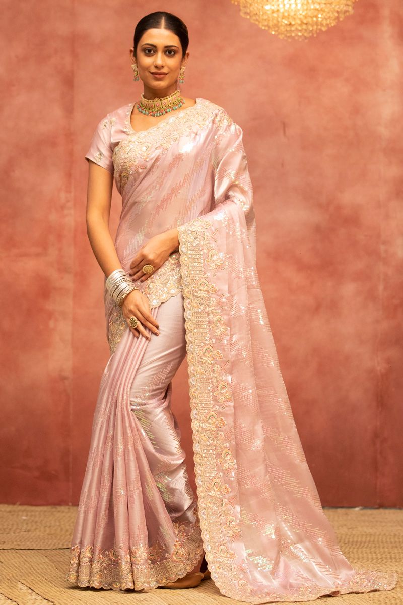 Radiant Embroidered Work On Peach Color Organza Fabric Saree