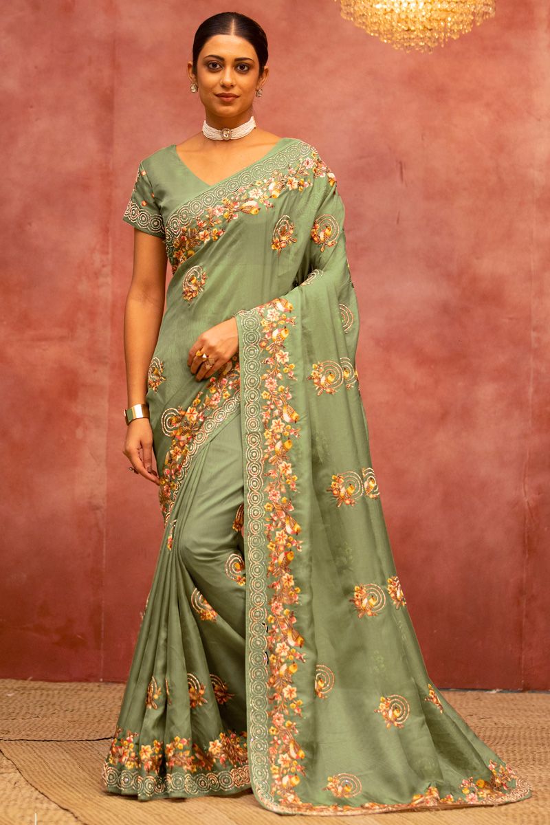 Creative Embroidered Work On Saree In Green Color Net Fabric