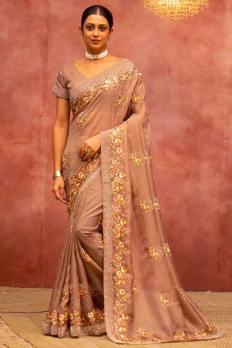 Marvellous Embroidered Work On Net Fabric Saree In Beige Color