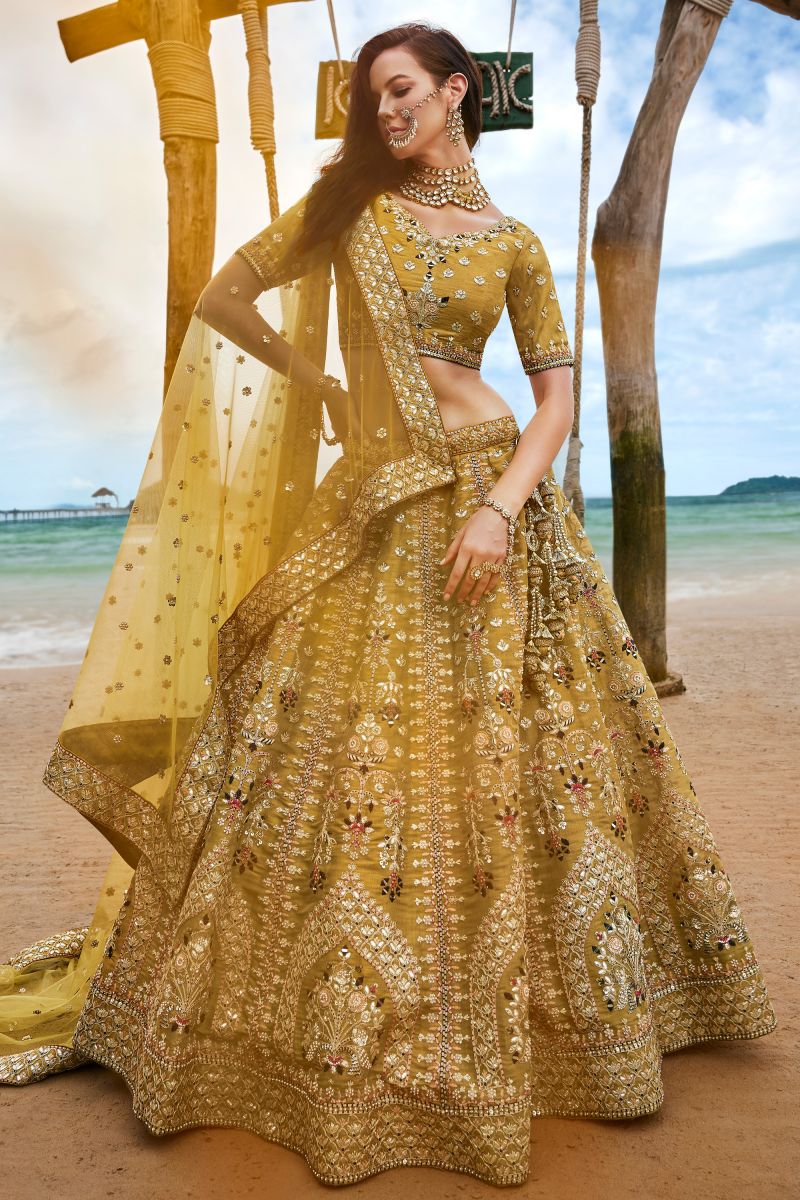 Stylish Mustard Net Sequins Embroidery Lehenga Choli