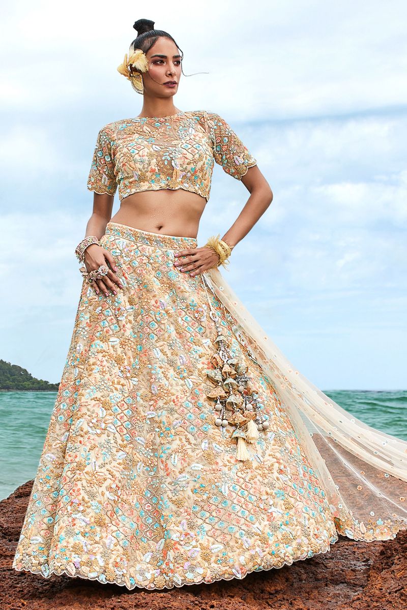 Cream Net Occasion Wear Lehenga Choli With Sequins Work