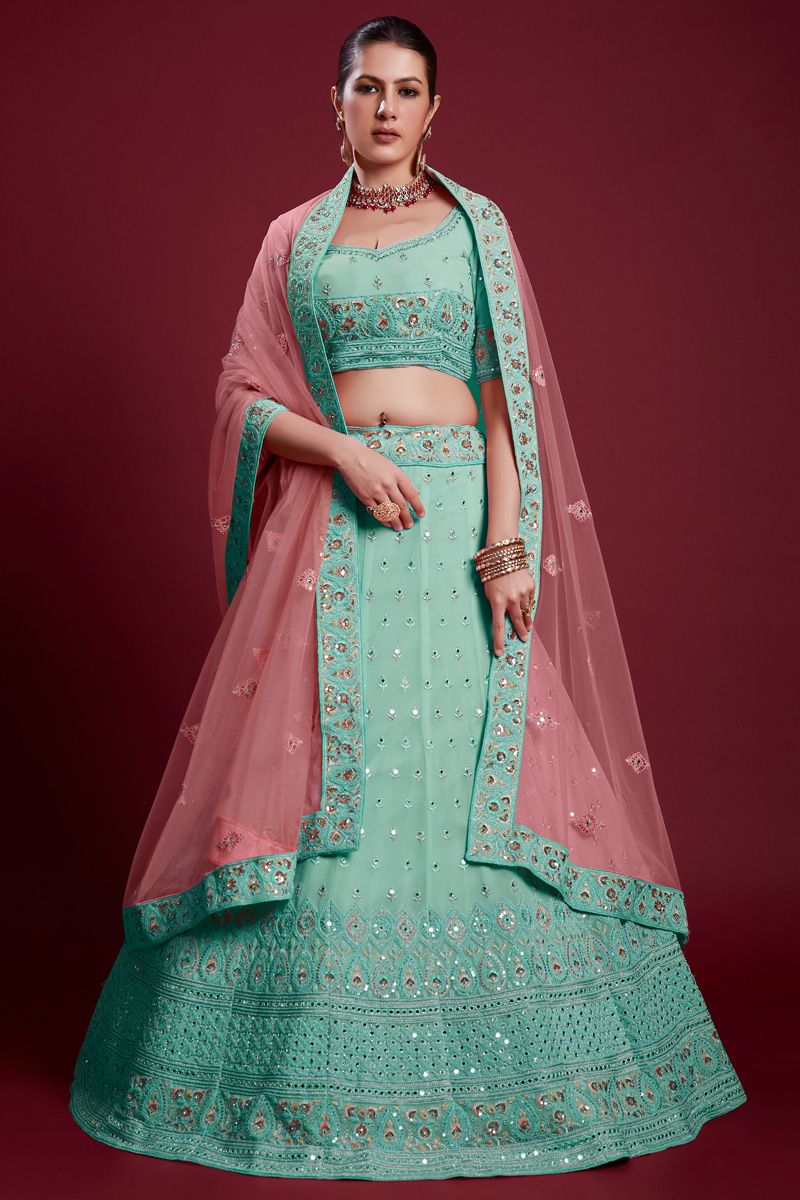 Glamorous Georgette Cyan Color Lehenga with Zarkan Work