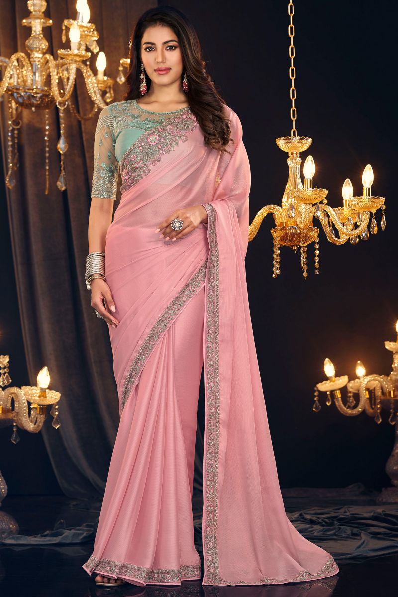 Border Work On Peach Color Georgette Fabric Saree