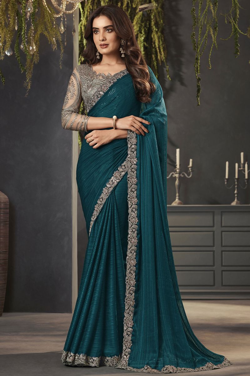 Exclusive Lace Border Work Teal Color Satin Fabric Saree With Embroidered Blouse