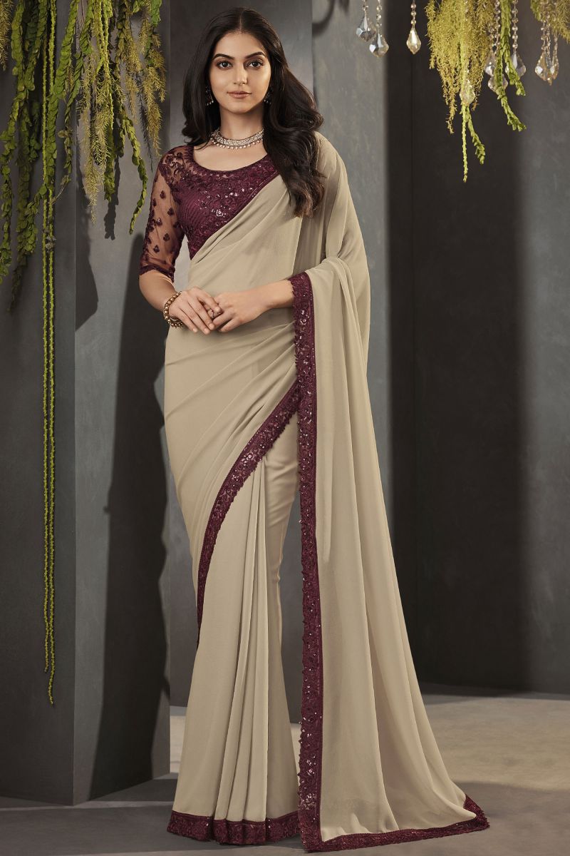 Beige Color Georgette Fabric Lace Border Work Saree With Embroidered Blouse