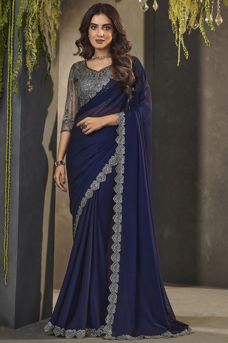 Lace Border Work Blue Color Georgette Fabric Saree With Embroidered Blouse