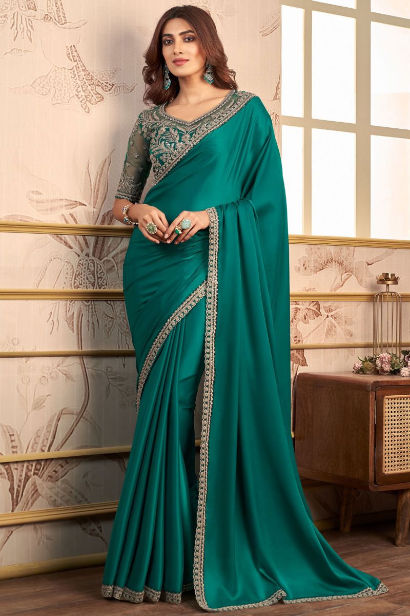 Engaging Cyan Color Satin Lace Work Saree With Heavy Embroidered Blouse