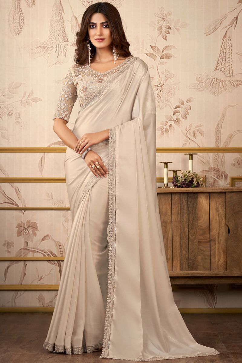 Radiant Beige Color Satin Lace Work Saree With Heavy Embroidered Blouse