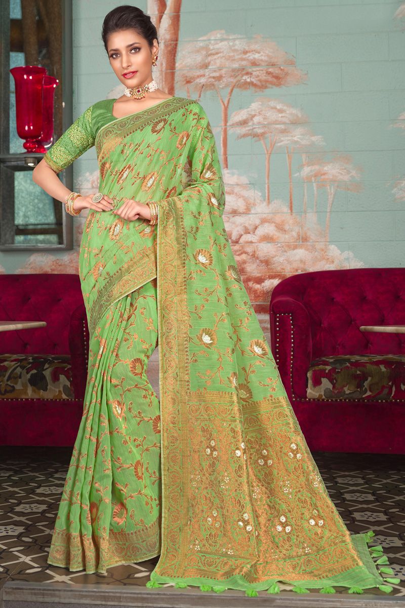 Organza Fabric Green Color Engaging Weaving Designs Saree