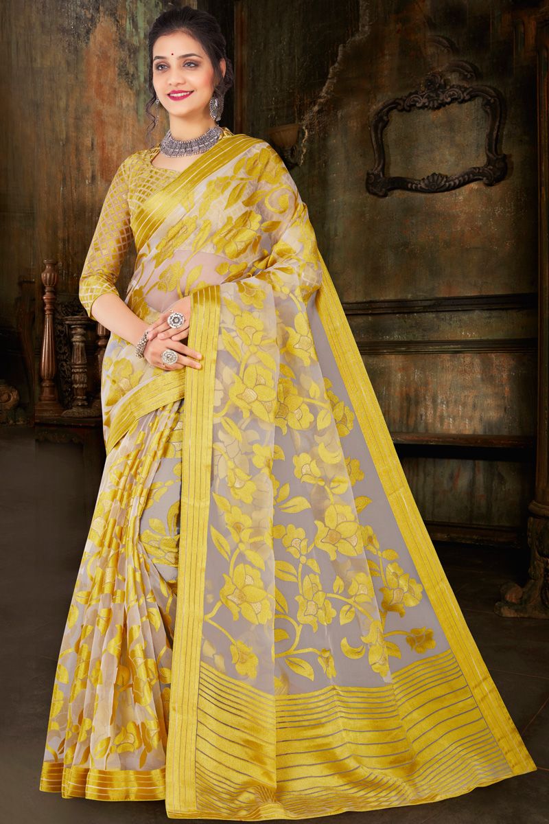 Awesome Foil Printed Organza Saree In Yellow Color