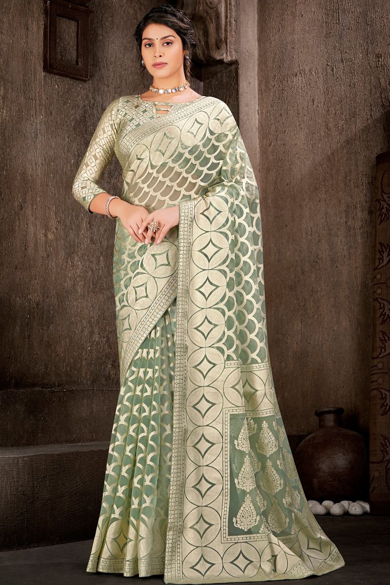 Brasso Sea Green Color Saree With Foil Printed Work 