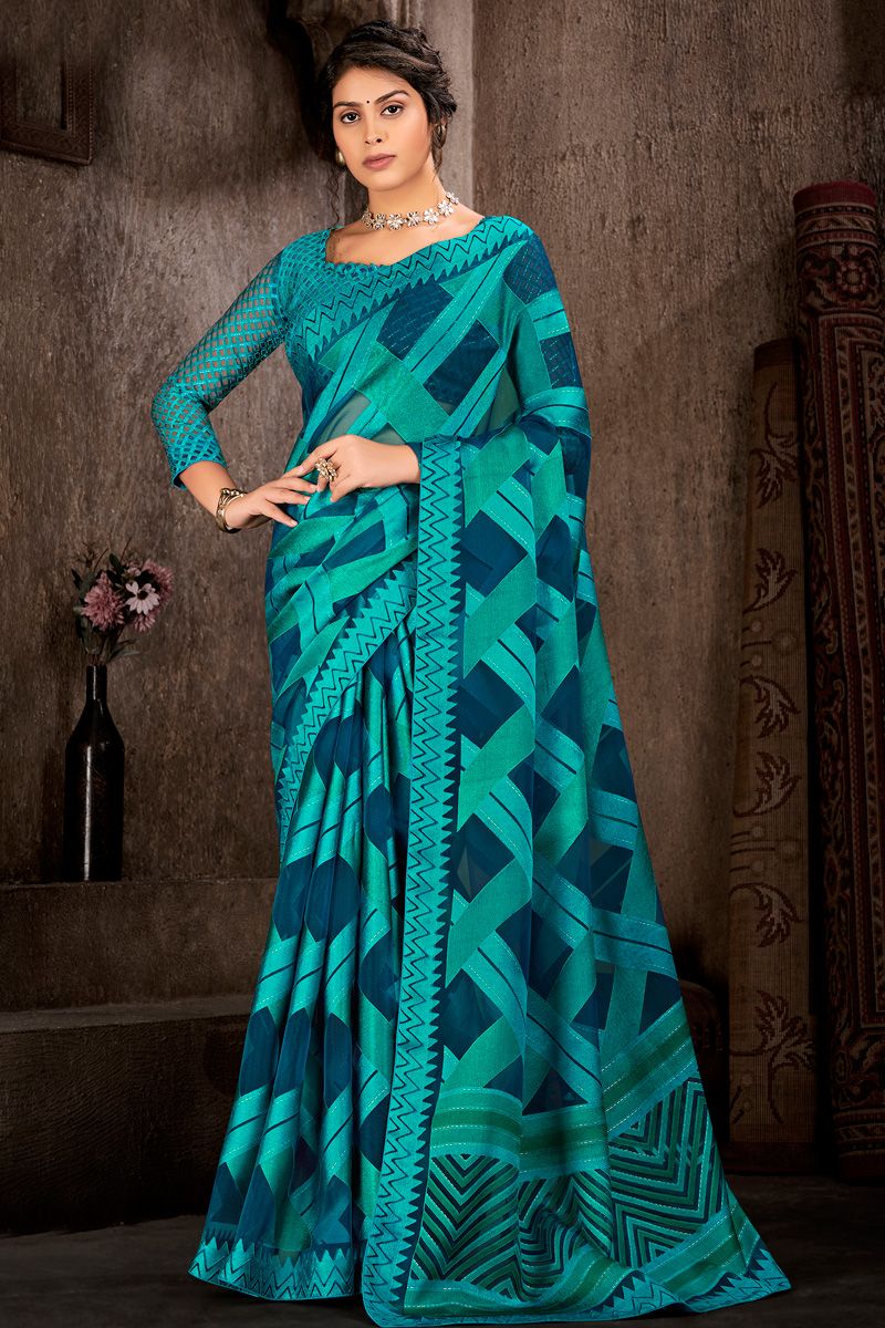 Sea Green Color Brasso Saree With Foil Printed Work