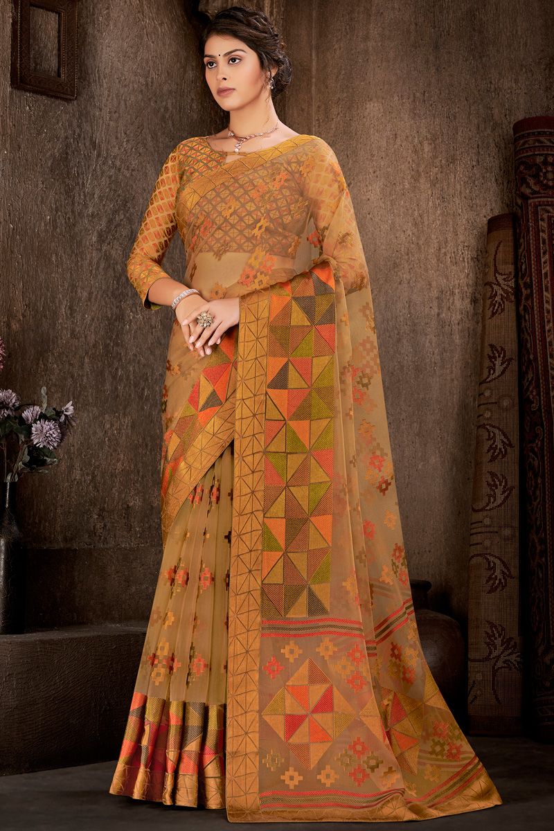 Brasso Saree In Rust Color With Foil Printed Work