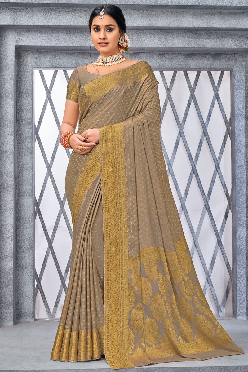 Beige Color Chiffon Fabric Appealing Weaving Work Saree