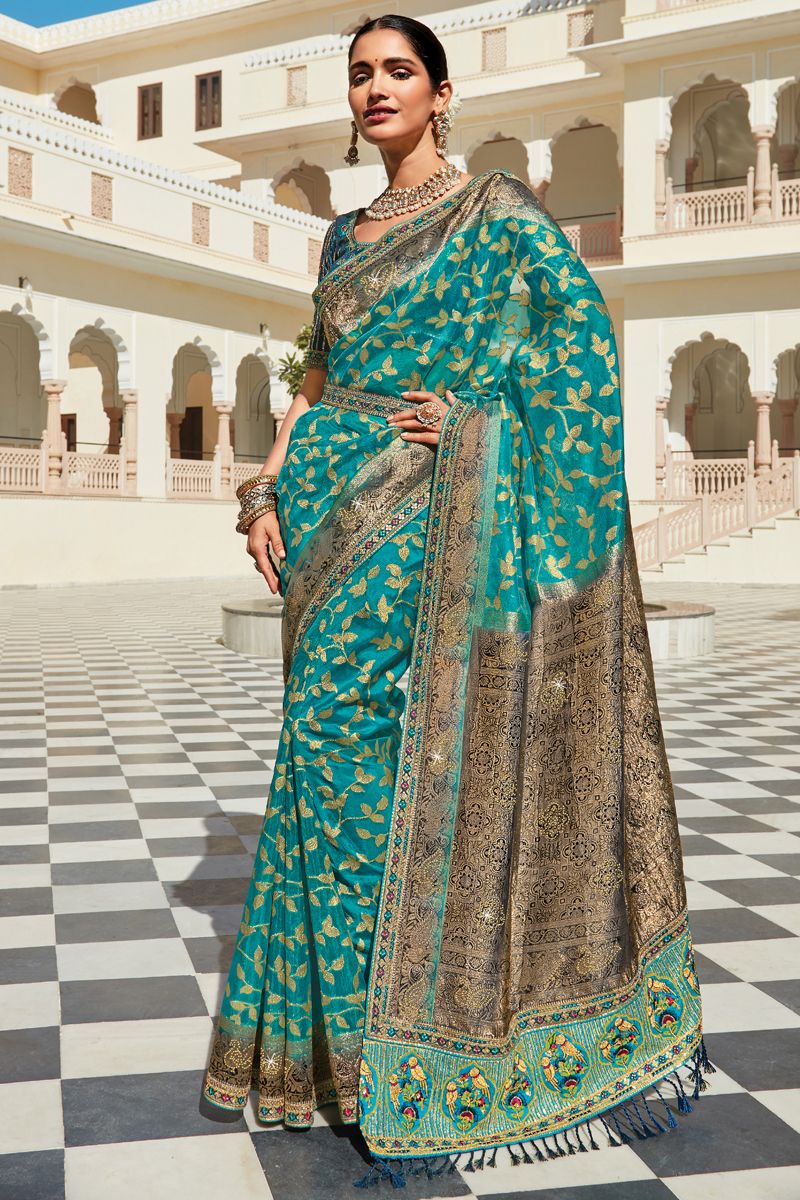 Cyan Color Organza Fabric Sangeet Wear Weaving Work Saree With Heavy Embroidered Blouse