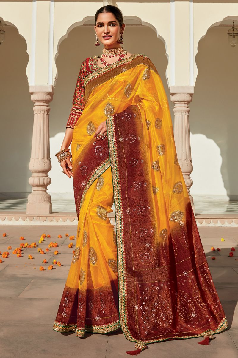 Yellow Color Reception Wear Weaving Work Organza Fabric Saree With Heavy Embroidered Blouse