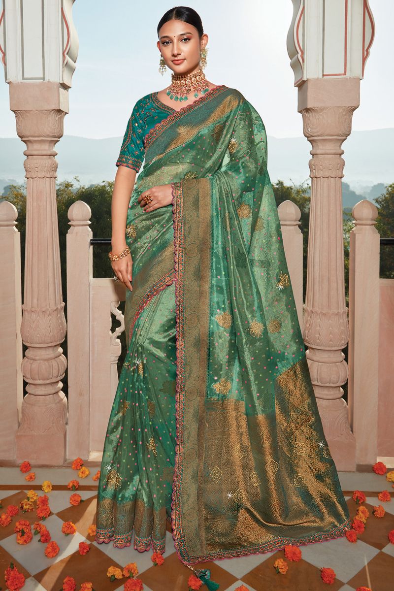 Organza Fabric Sangeet Wear Green Color Weaving Work Saree With Heavy Embroidered Blouse